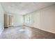 Open living room with tile floors, fresh paint, lots of windows, and neutral decor at 1723 Ritcherson Se St, Marietta, GA 30060