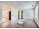 Open living room with tile floors, fresh paint, lots of windows, and neutral decor at 1723 Ritcherson Se St, Marietta, GA 30060