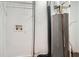 Utility area featuring a water heater, washer and dryer hookups, and storage solutions at 1723 Ritcherson Se St, Marietta, GA 30060