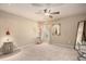 Neutral bedroom with large mirror, bedside table, and ample closet space at 233 Millstone Pkwy, Woodstock, GA 30188