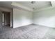 Open bedroom with doors for closets and bathroom at 358 Forkview Dr, Lawrenceville, GA 30044