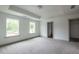 Spacious bedroom with lots of light and a walk in closet at 358 Forkview Dr, Lawrenceville, GA 30044