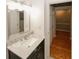 Bathroom with a marble vanity top and tile floors at 485 Sherman Way, Decatur, GA 30033