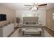 Staged main bedroom features a large window, neutral colors, and ample natural light at 485 Sherman Way, Decatur, GA 30033