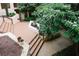 Exterior shot of the property's inviting courtyard with lush greenery and garden features at 485 Sherman Way, Decatur, GA 30033