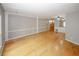 Expansive living room featuring hardwood floors and neutral walls at 485 Sherman Way, Decatur, GA 30033