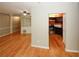 Open living area showing hardwood floors leading to a bright kitchen at 485 Sherman Way, Decatur, GA 30033
