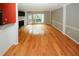 Bright living room showcasing beautiful hardwood floors, fireplace, and lots of natural light at 485 Sherman Way, Decatur, GA 30033
