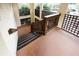 A descending outdoor staircase with brown railings, in a community area at 485 Sherman Way, Decatur, GA 30033