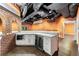 Basement kitchen area with stainless appliances, exposed ductwork, and modern lighting at 5826 Sarazen Trl, Douglasville, GA 30135