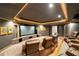 Luxurious home theater with large screen, comfortable seating and decorative lighting at 5826 Sarazen Trl, Douglasville, GA 30135