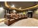 Cozy home theater with recliner seating, carpet, and ambient lighting at 5826 Sarazen Trl, Douglasville, GA 30135