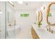 Luxurious bathroom with marble countertops, soaking tub, glass enclosed shower and stylish fixtures at 1042 Oakdale Se Dr, Smyrna, GA 30080