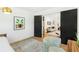 Inviting bedroom with natural light, fresh paint, and wood floors; flows seamlessly into the open living area at 1042 Oakdale Se Dr, Smyrna, GA 30080