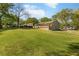 Stylish home featuring a spacious backyard and a lovely deck perfect for outdoor relaxation and entertaining at 1042 Oakdale Se Dr, Smyrna, GA 30080
