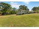Charming home with a large front yard and mature trees, offering a serene and private setting at 1042 Oakdale Se Dr, Smyrna, GA 30080