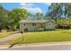 Charming single-story home featuring a well-manicured lawn and inviting curb appeal at 1042 Oakdale Se Dr, Smyrna, GA 30080