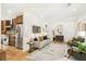 Inviting living room with an open layout, hardwood floors, and stylish modern decor throughout the home at 1042 Oakdale Se Dr, Smyrna, GA 30080