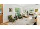 Bright living room with hardwood floors and a cozy seating area perfect for relaxation and entertaining at 1042 Oakdale Se Dr, Smyrna, GA 30080
