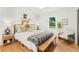 Comfortable bedroom with a large bed, natural light, and tasteful decor at 1042 Oakdale Se Dr, Smyrna, GA 30080