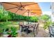 Outdoor patio setup perfect for entertaining with grill and lots of lush green plants at 210 Creekside Overlook, Hiram, GA 30141