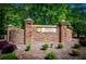 Stone sign for Highlands at Creekside community surrounded by lush greenery at 210 Creekside Overlook, Hiram, GA 30141