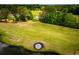 A view of the lush golf course, with water features, set in a serene and natural environment at 210 Creekside Overlook, Hiram, GA 30141