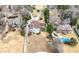Expansive aerial view shows a neighborhood with lake access and sprawling lawns at 3167 Bay View Dr, Jonesboro, GA 30236