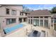 Backyard patio with outdoor seating and a covered pool at 3167 Bay View Dr, Jonesboro, GA 30236