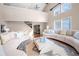 Spacious living room with high ceilings, large windows, and plush seating arrangement at 3167 Bay View Dr, Jonesboro, GA 30236