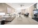 Open-concept living room with tile floors, neutral tones, and a clear view into other living spaces at 3167 Bay View Dr, Jonesboro, GA 30236