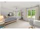 Spacious bedroom with large windows providing plenty of natural light, and elegant, neutral decor at 4005 N Stratford Ne Rd, Atlanta, GA 30342