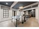 Bright and airy game room with a ping pong table and a wet bar in the background at 4005 N Stratford Ne Rd, Atlanta, GA 30342
