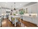 Spacious white kitchen with center island, stainless steel appliances, and ample counter space at 4005 N Stratford Ne Rd, Atlanta, GA 30342