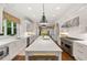 Gourmet kitchen with stainless steel appliances, quartz countertops, and a large center island at 4005 N Stratford Ne Rd, Atlanta, GA 30342