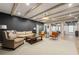Cozy living room featuring exposed beams, comfortable seating, and stylish decor at 4005 N Stratford Ne Rd, Atlanta, GA 30342