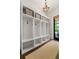 Well-organized mudroom with built-in cubbies for storage and a rug at 4005 N Stratford Ne Rd, Atlanta, GA 30342