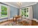 Cozy home office with large windows, natural light, and hardwood floors at 4005 N Stratford Ne Rd, Atlanta, GA 30342