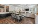 The dining room features hardwood floors and decorative molding, connecting to the living room at 821 Ethereow Ct, Lawrenceville, GA 30046