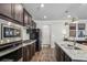 Spacious kitchen with stainless steel appliances, granite counters, and a convenient island for meal prep at 821 Ethereow Ct, Lawrenceville, GA 30046