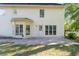 Concrete patio just outside of door has abundant room for outdoor dining at 120 Julia Ct, Fayetteville, GA 30214