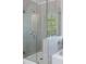 Modern bathroom featuring a glass shower and separate soaking tub at 120 Julia Ct, Fayetteville, GA 30214