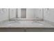 Bathroom vanity with double sinks and granite countertop at 120 Julia Ct, Fayetteville, GA 30214