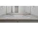 Bathroom with double sinks and granite countertop at 120 Julia Ct, Fayetteville, GA 30214