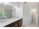 Double vanity bathroom with sleek countertops, modern fixtures, and natural light at 120 Julia Ct, Fayetteville, GA 30214