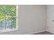 Bright bedroom with a window and neutral carpet flooring at 120 Julia Ct, Fayetteville, GA 30214