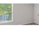 Bedroom with neutral walls, carpeted floors and a window offering natural light at 120 Julia Ct, Fayetteville, GA 30214