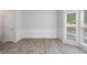 Dining room with white walls and light-colored wood floors at 120 Julia Ct, Fayetteville, GA 30214