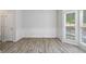 Dining area with hardwood floors, white walls, and natural light at 120 Julia Ct, Fayetteville, GA 30214