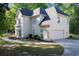 Charming two-story traditional home featuring side-entry garage and mature trees at 120 Julia Ct, Fayetteville, GA 30214